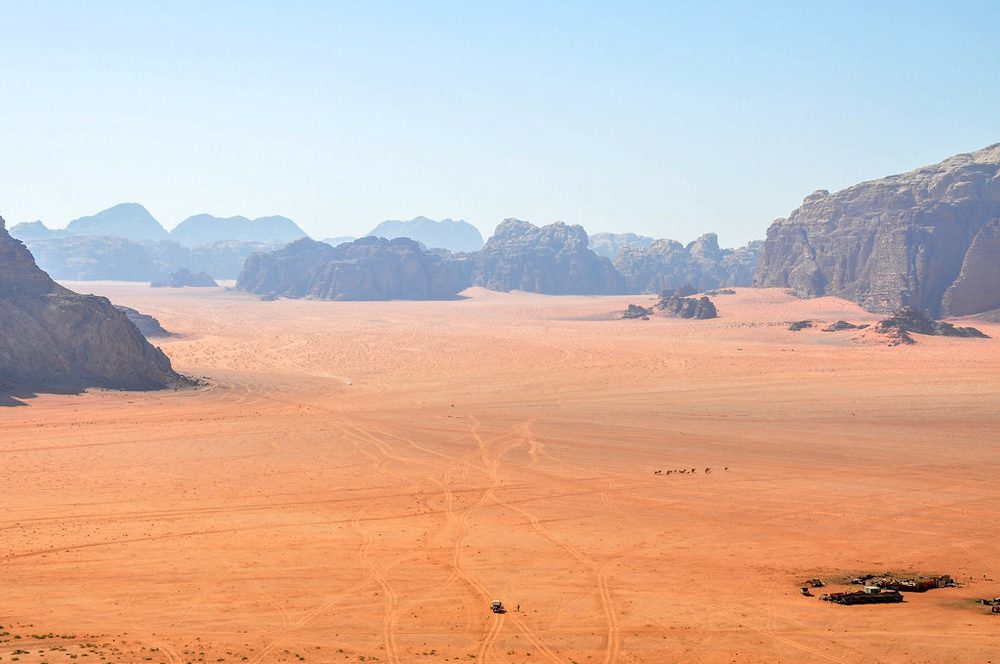 Lawrence of Arabia — Wadi Rum, the valley where T. E. Lawrence (Lawrence of Arabia) passed by during the Arab Revolt, and a group of camels
